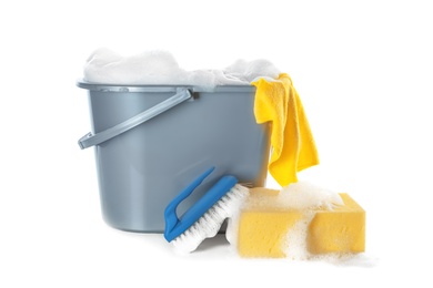 Photo of Plastic bucket with foam and sponge on white background. Cleaning supplies