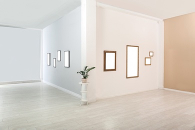 Photo of View on empty hall of modern art gallery