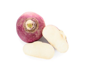 Cut and whole fresh ripe turnips on white background, top view