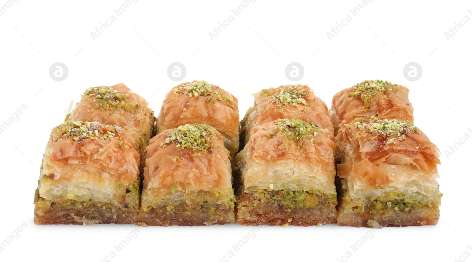 Photo of Delicious fresh baklava with chopped nuts isolated on white. Eastern sweets