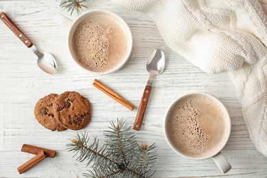 Photo of Flat lay composition with hot cocoa drink and cookies on light background
