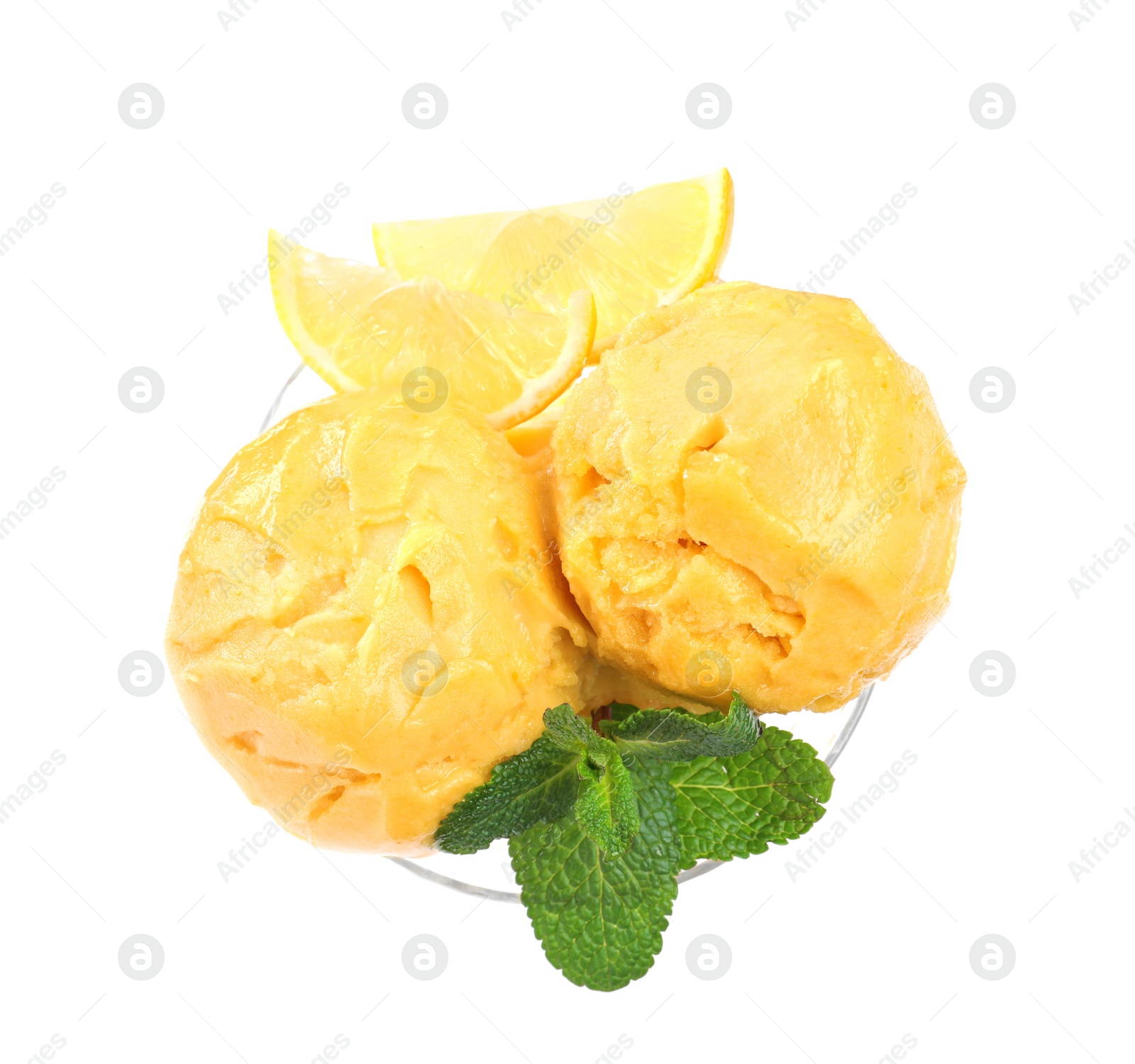 Photo of Delicious yellow ice cream with mint and lemon in glass dessert bowl isolated on white, top view