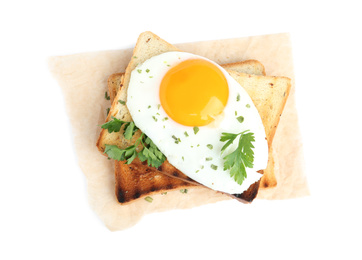 Photo of Tasty fried egg with toasts and parsley isolated on white, top view