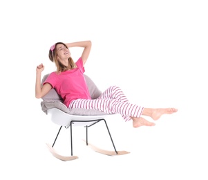 Photo of Young woman relaxing in armchair on white background