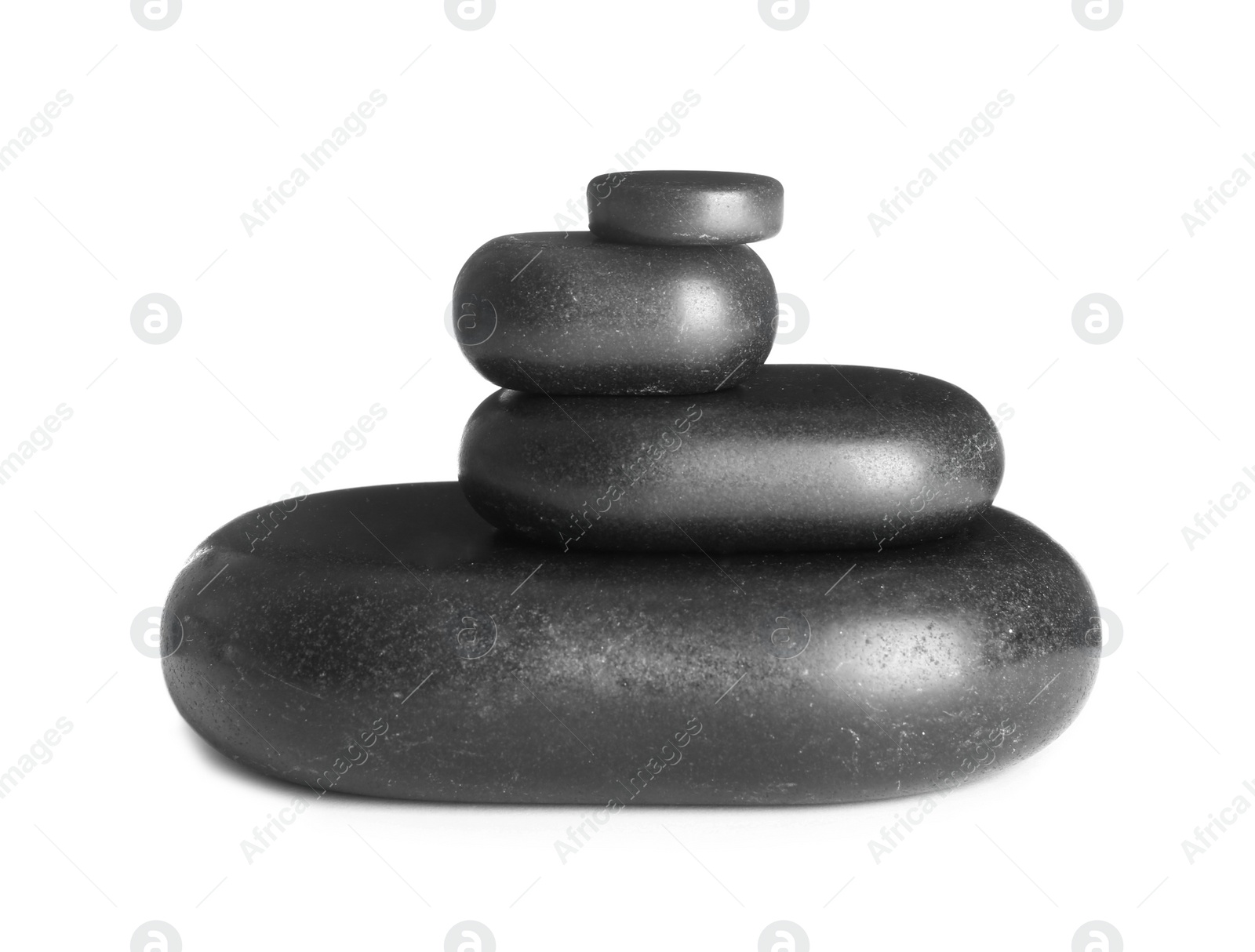 Photo of Stack of zen spa stones on white background