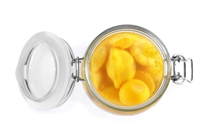 Photo of Open jar with pickled custard squashes on white background, top view