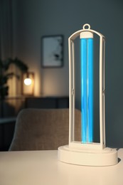 UV sterilizer lamp on table at home