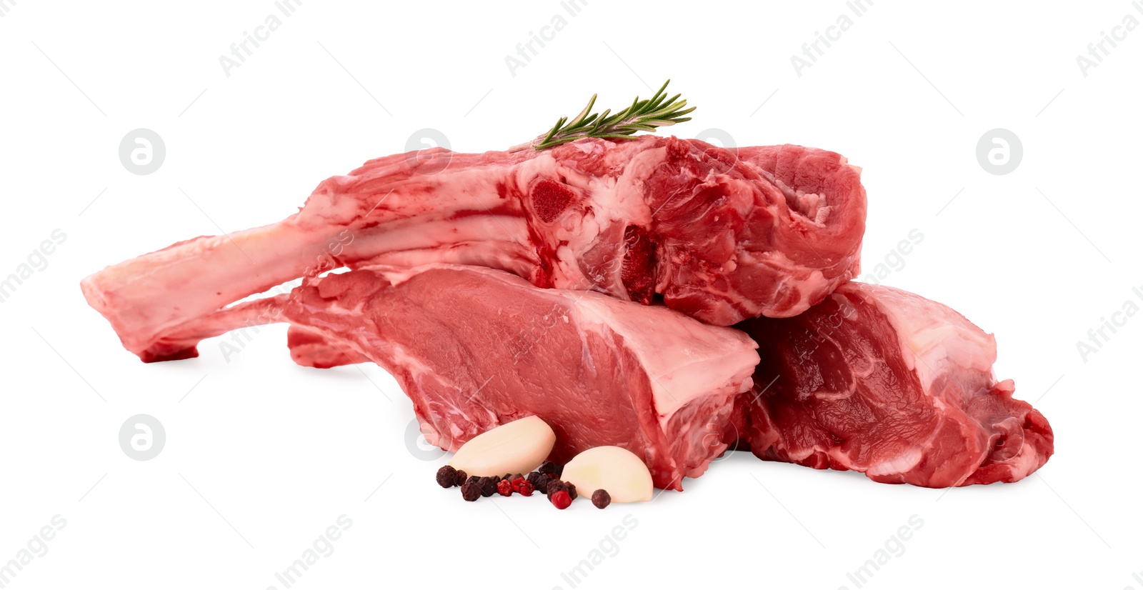 Photo of Pieces of raw beef meat and spices isolated on white