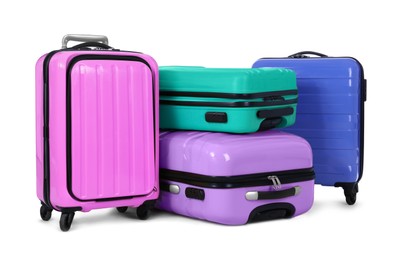 Image of Stylish suitcases packed for travel on white background 