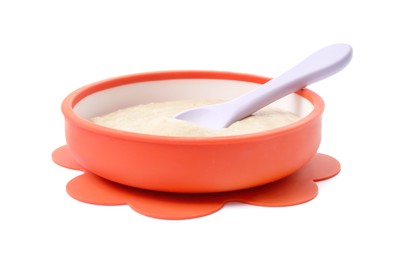 Photo of Tasty baby food and spoon in bowl isolated on white