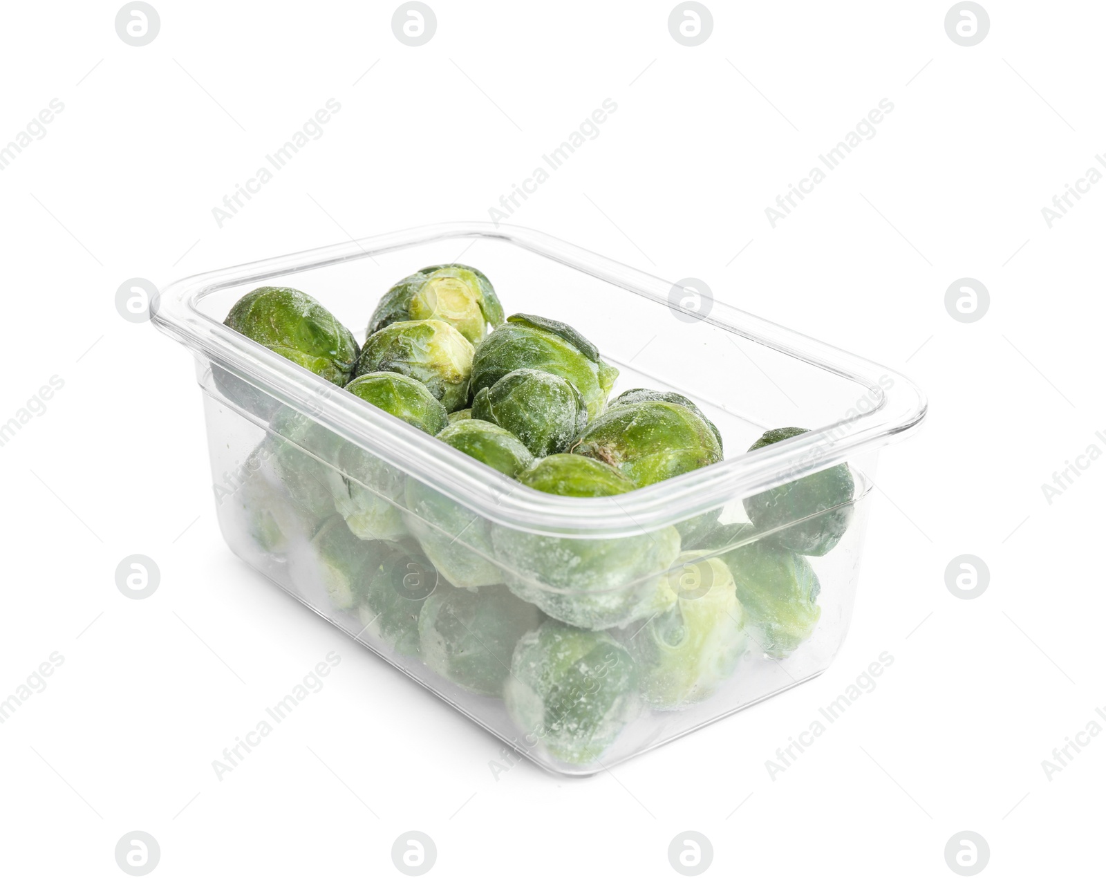 Photo of Frozen Brussels sprouts in plastic container isolated on white. Vegetable preservation