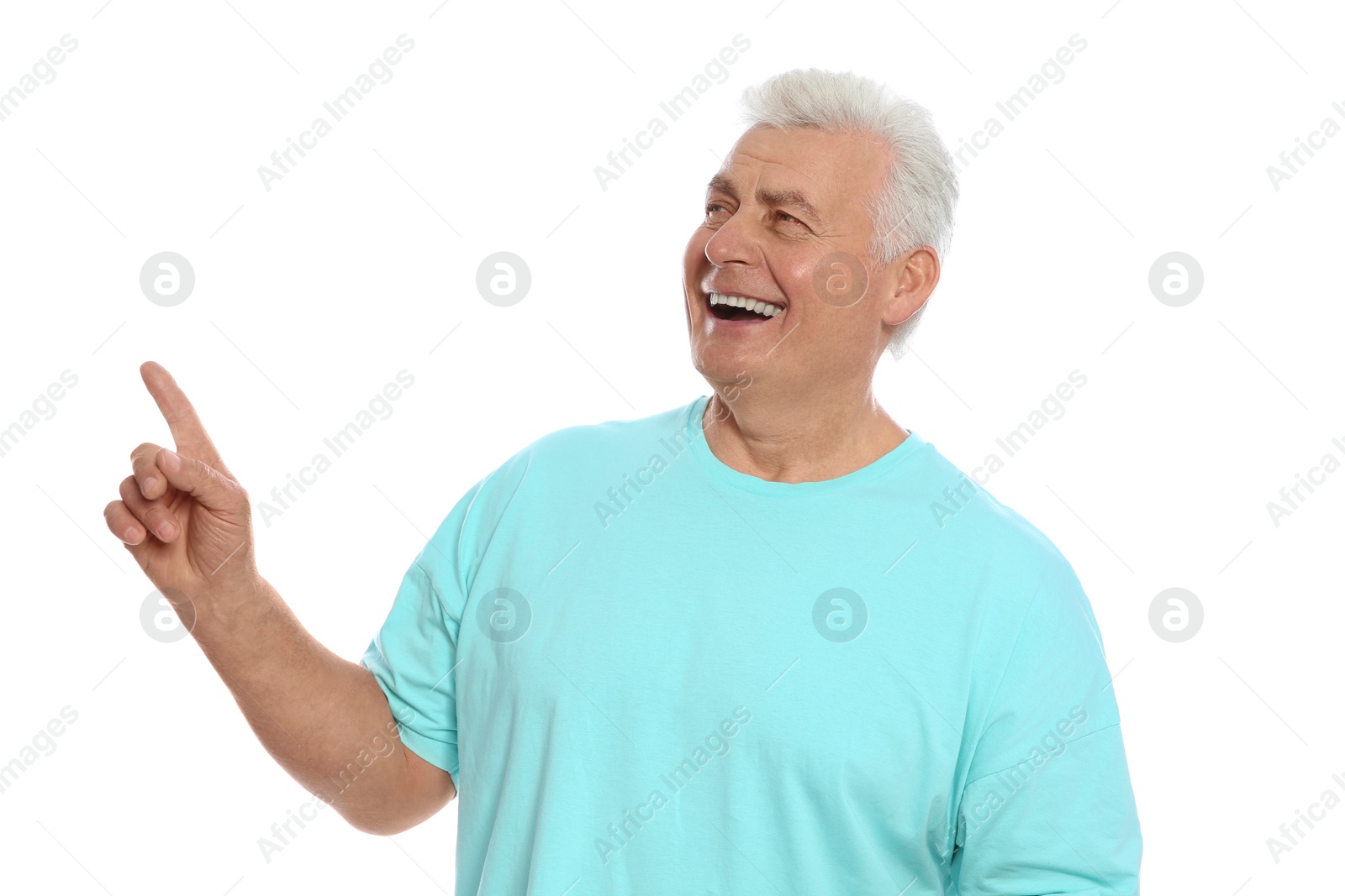 Photo of Portrait of mature man laughing on white background