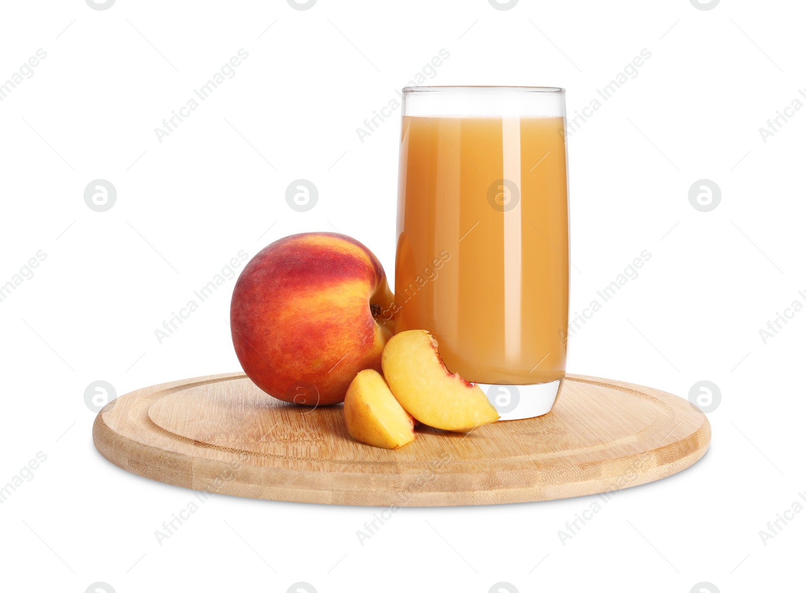Photo of Glass of delicious juice, whole and cut peaches isolated on white