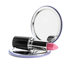 Stylish cosmetic pocket mirror and lipstick on white background
