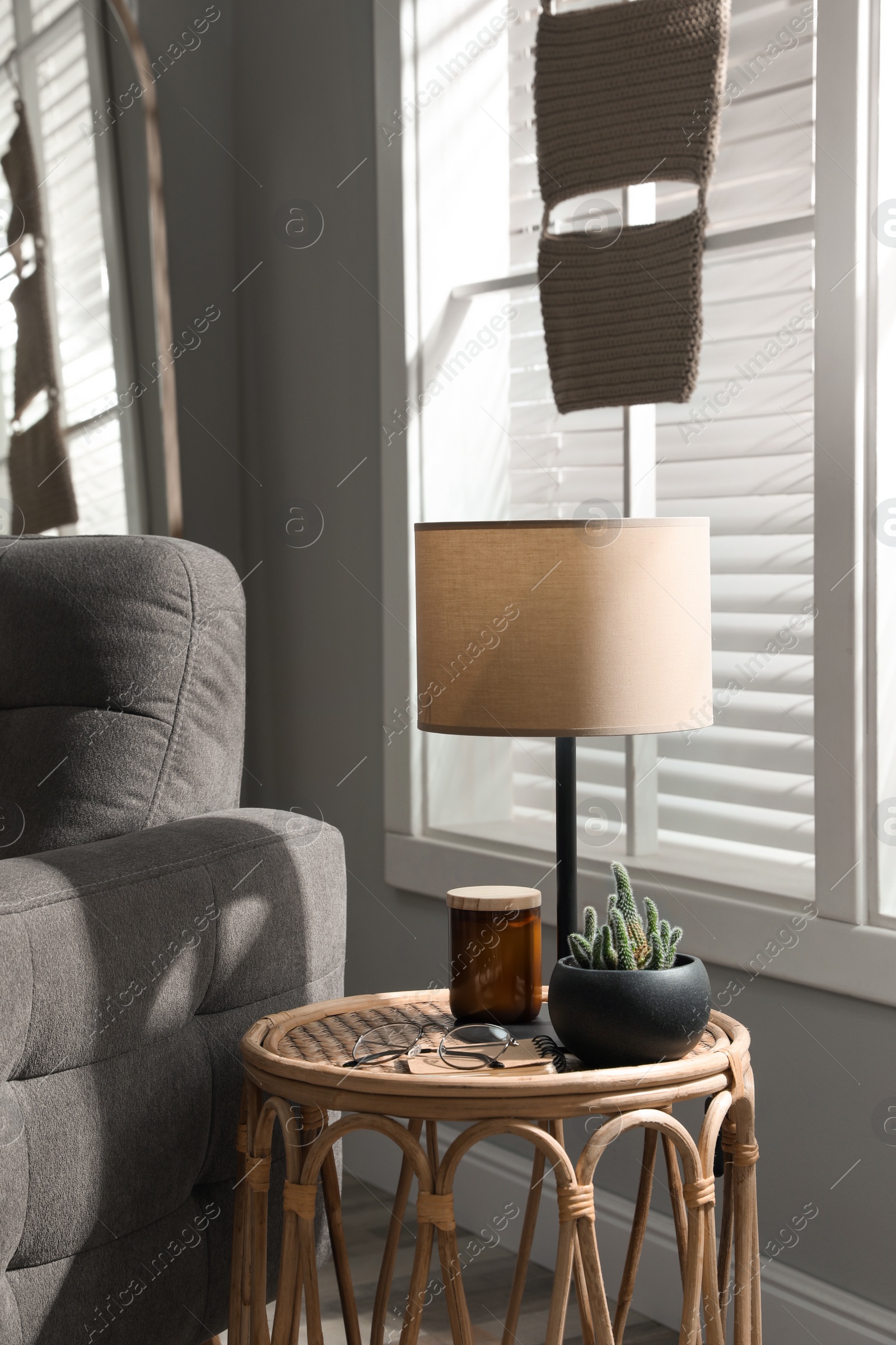 Photo of Room interior with stylish lamp and furniture