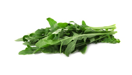 Heap of fresh arugula leaves isolated on white