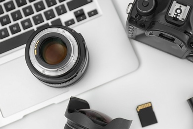 Photo of Composition with equipment for professional photographer on white background