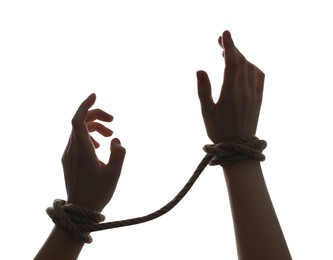 Photo of Freedom concept. Woman with tied arms on white background, closeup