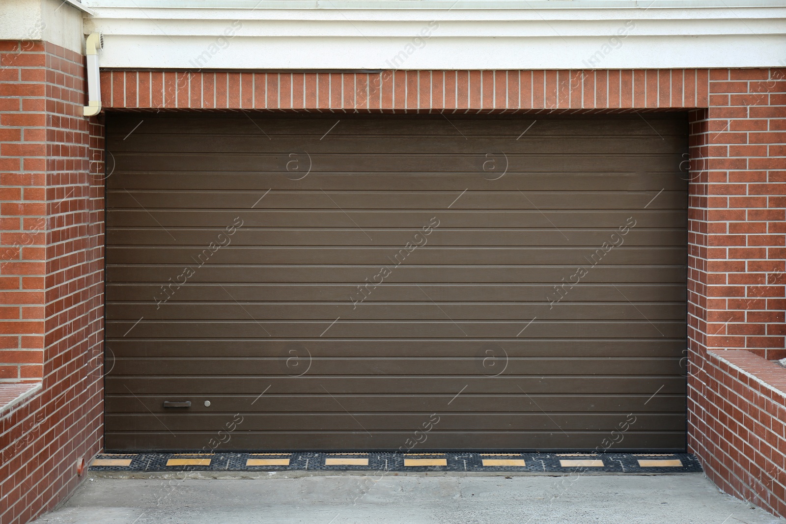 Photo of Closed roller shutter door of modern garage