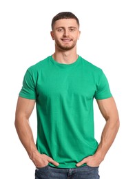 Man wearing green t-shirt on white background. Mockup for design