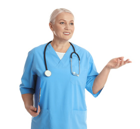 Mature doctor with clipboard and stethoscope on white background