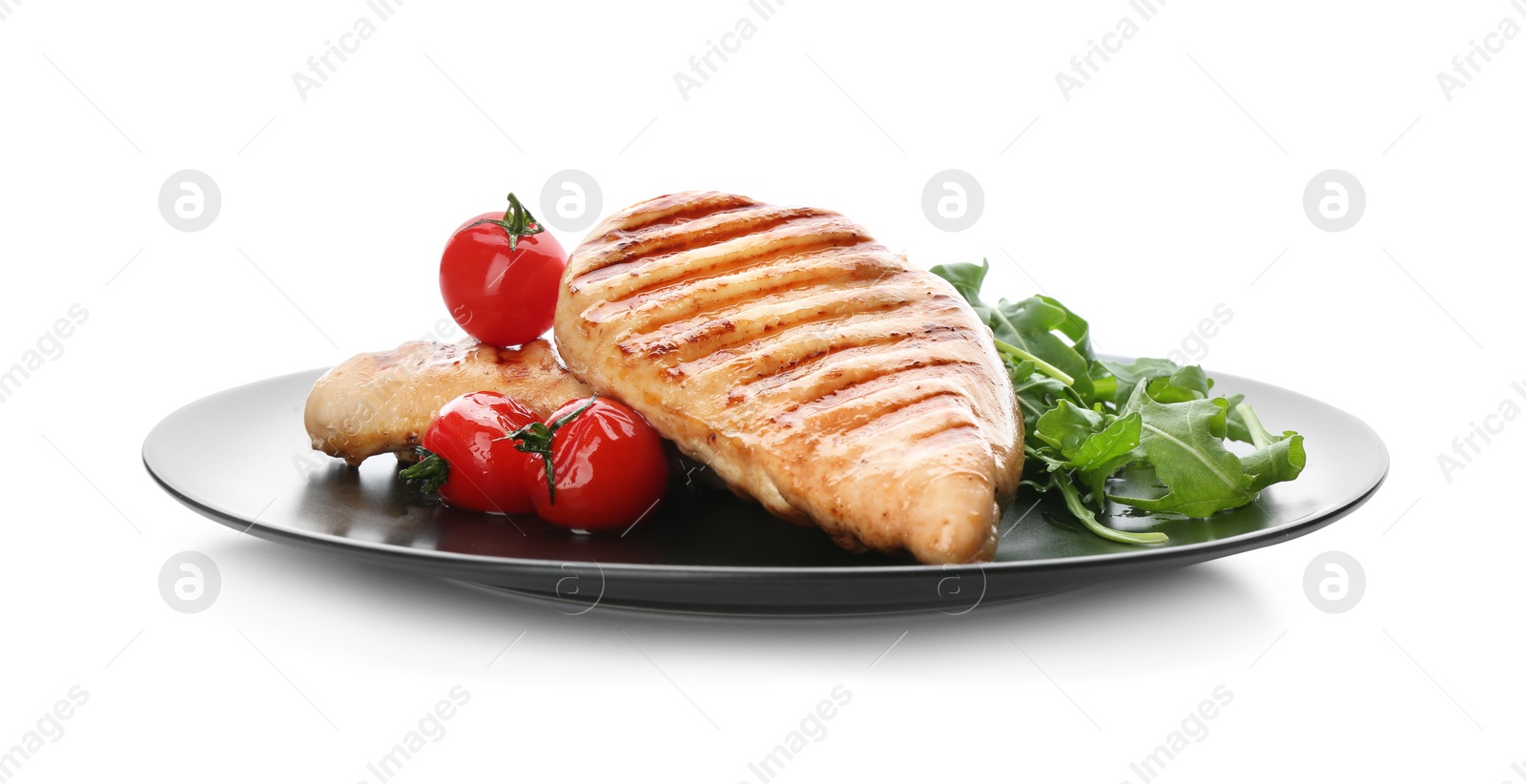 Photo of Tasty grilled chicken fillets with tomatoes and arugula isolated on white