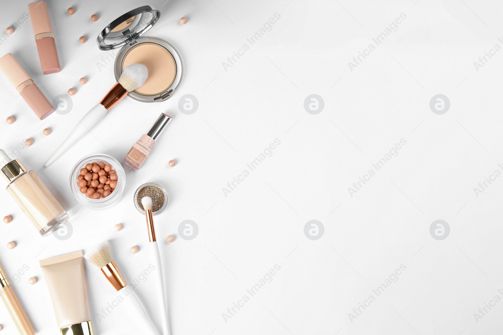 Photo of Flat lay composition with makeup brushes on white background, space for text