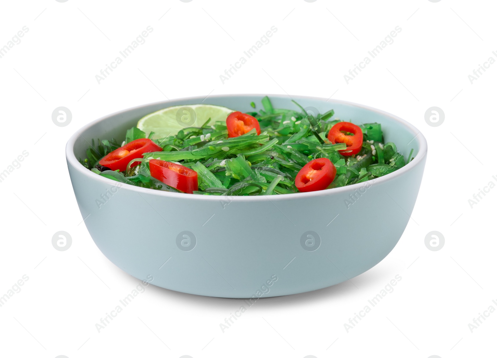 Photo of Tasty seaweed salad in bowl isolated on white