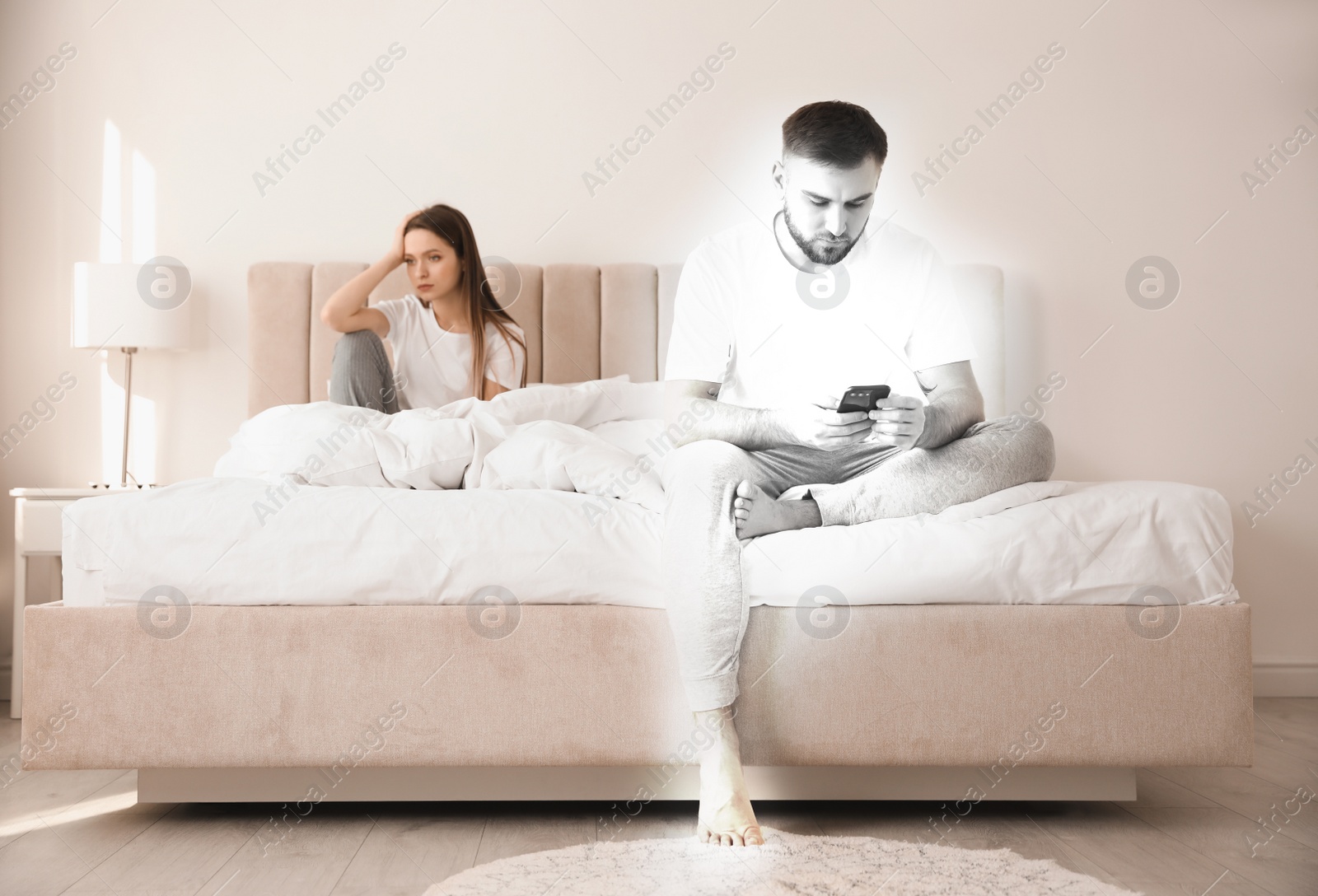 Image of Unhappy young couple with relationship problems at home. Cheating and breakup