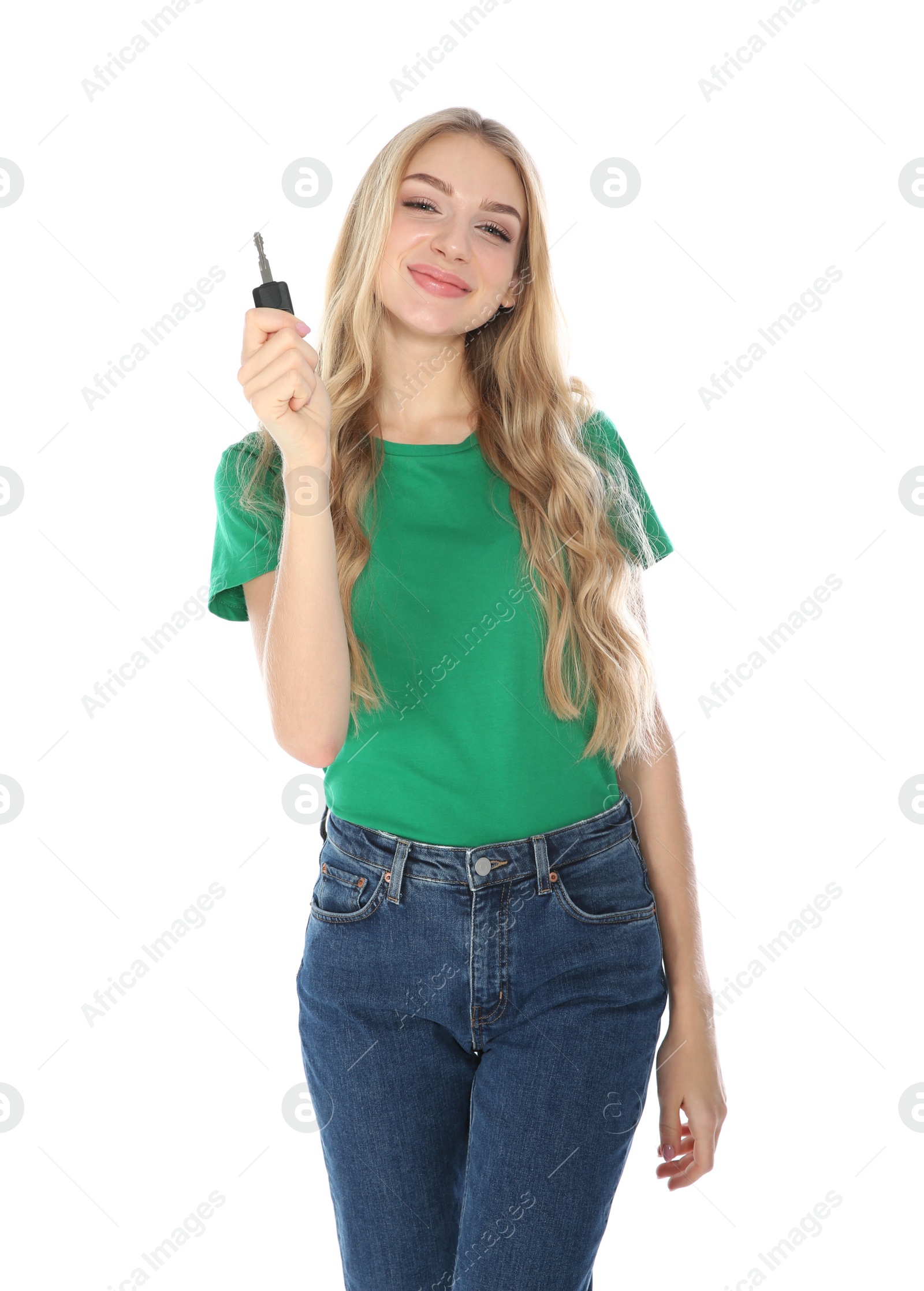 Photo of Happy young woman with car key on white background. Getting driving license