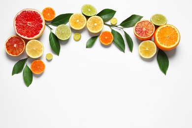 Photo of Flat lay composition with different citrus fruits on white background