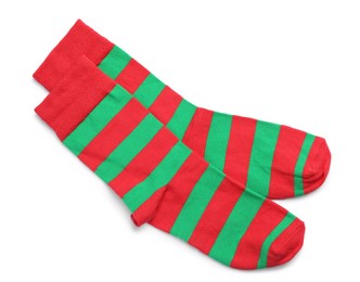 Photo of Pair of striped socks on white background, top view