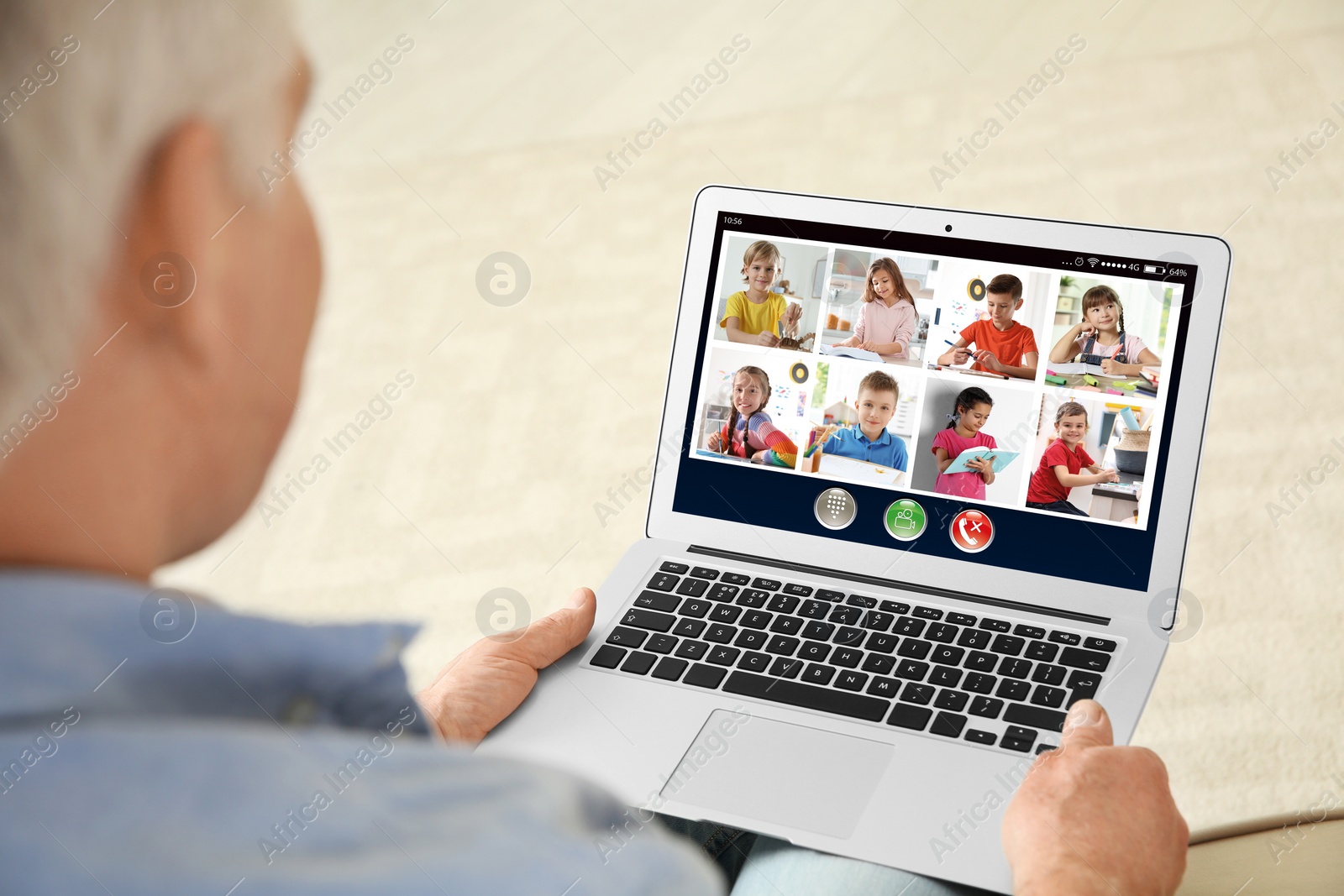 Image of Teacher giving online school lesson during quarantine and social distancing due to Covid-19 pandemic, closeup. Pupils studying at home via video conference