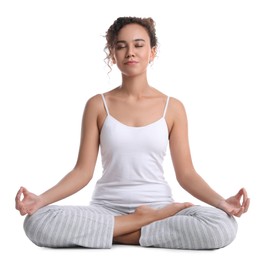 Beautiful African-American woman meditating on white background