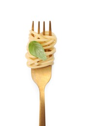 Fork with tasty pasta and basil isolated on white, top view