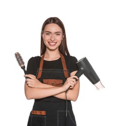 Photo of Portrait of happy hairdresser with round brush and hairdryer on white background