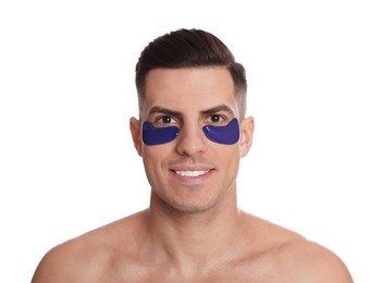 Photo of Man with blue under eye patches on white background