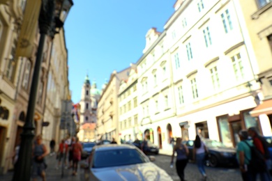 PRAGUE, CZECH REPUBLIC - APRIL 25, 2019: Blurred view of city street with old buildings