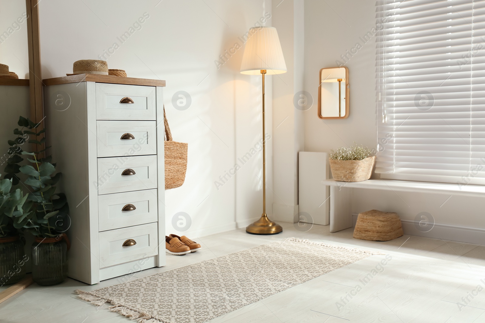 Photo of Chest of drawers in stylish room interior