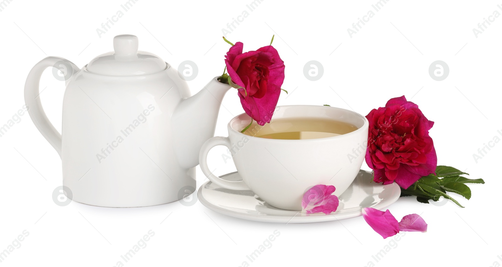 Photo of Aromatic herbal tea with rose flowers isolated on white