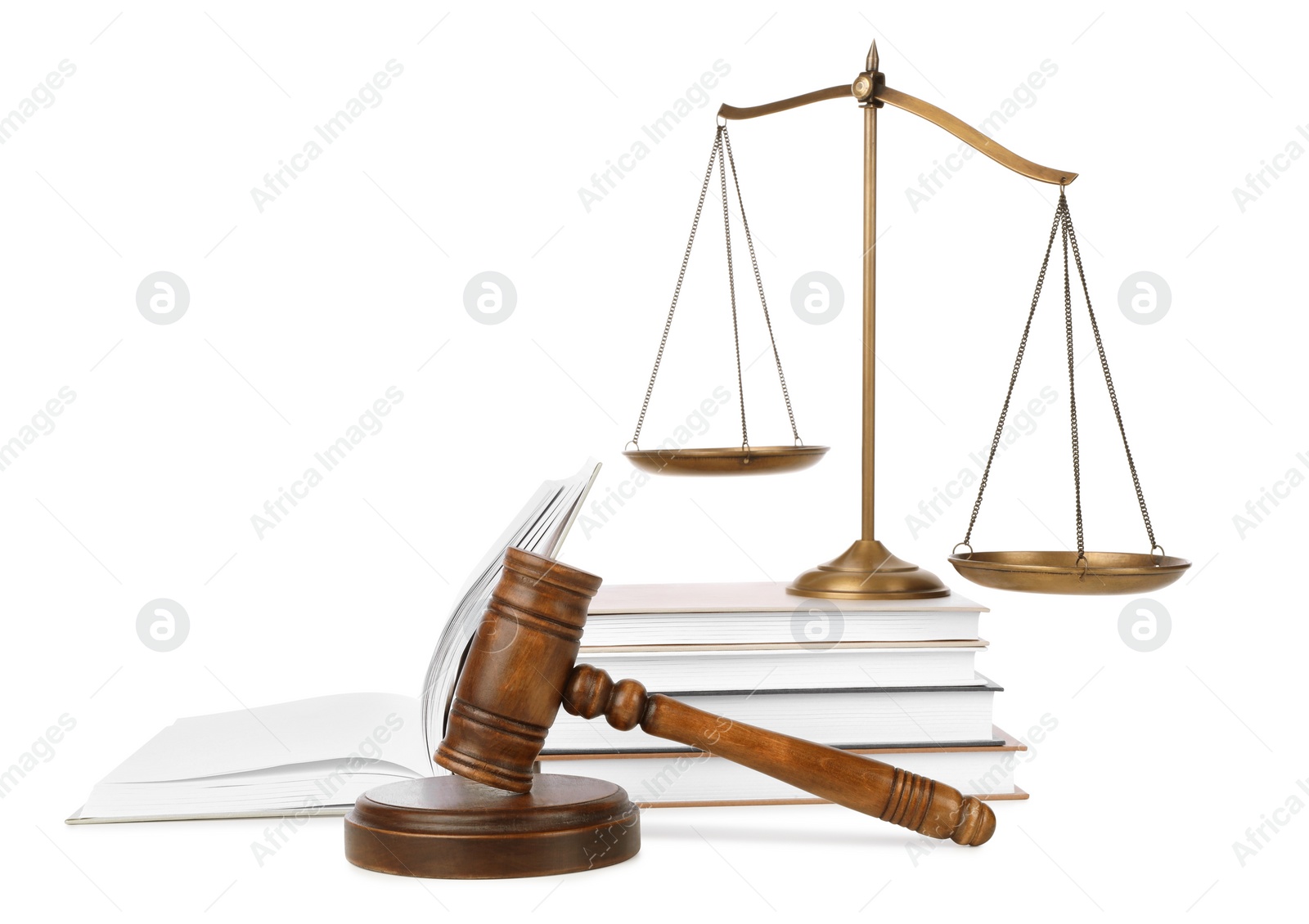 Photo of Wooden gavel, books and scales of justice on white background