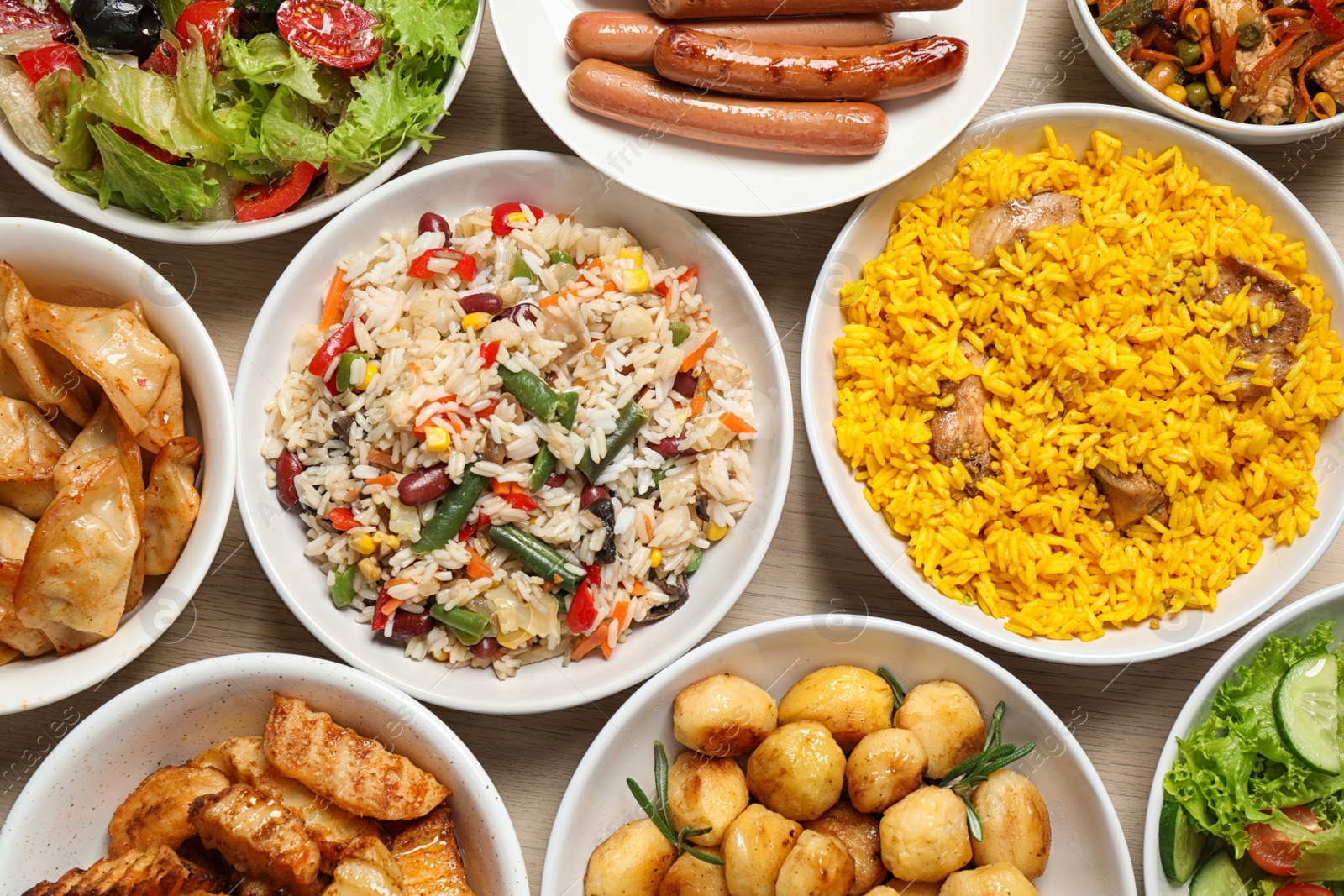 Photo of Different delicious dishes on table, flat lay. Buffet service