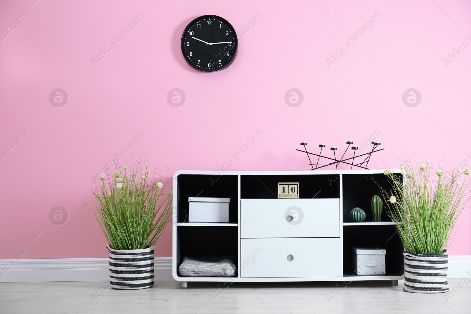 Photo of Elegant room interior with stylish shelving unit