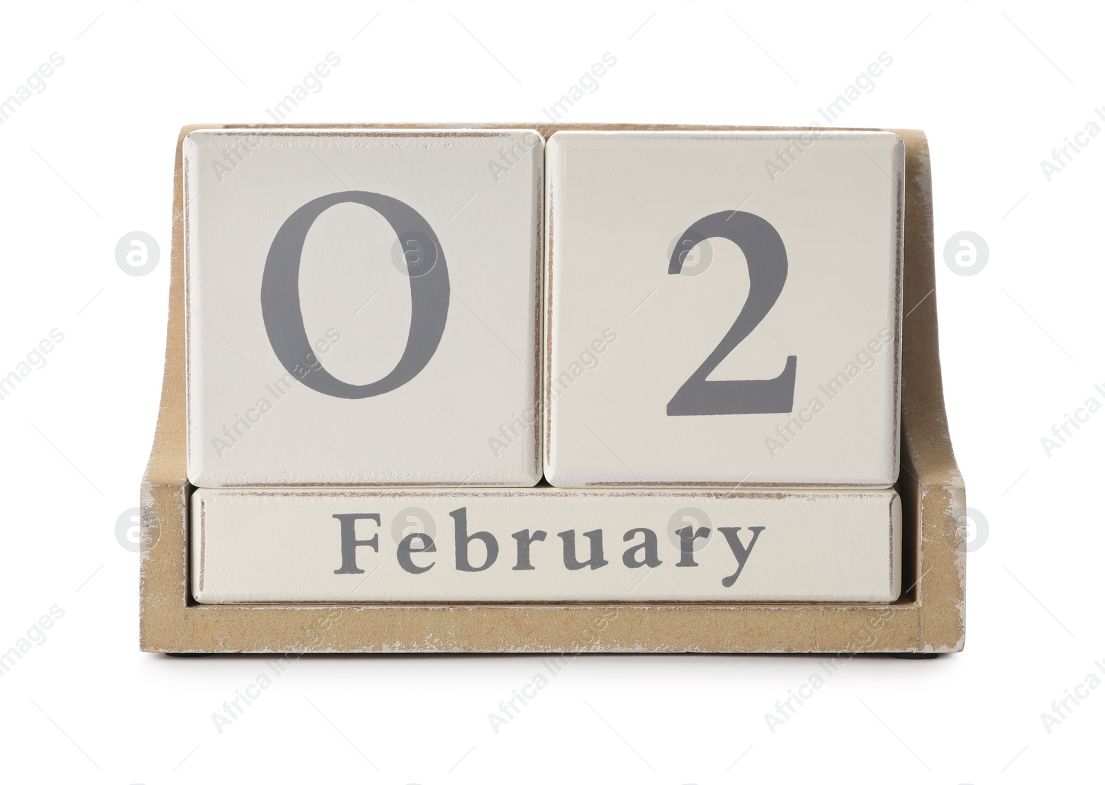 Photo of Wooden block calendar with date February 2nd on white background. Groundhog day