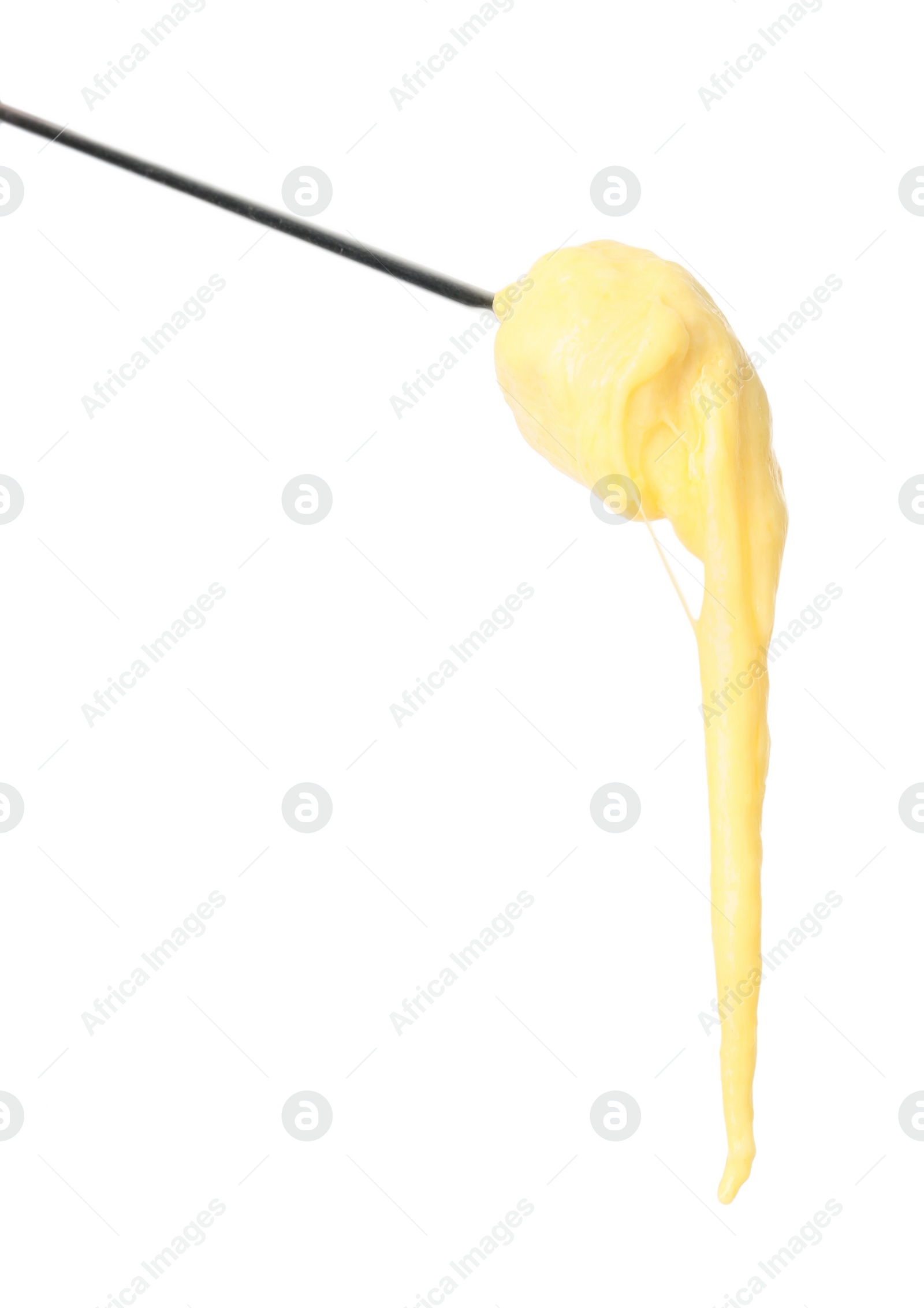 Photo of Tasty fondue. Fork with piece of ham and melted cheese isolated on white
