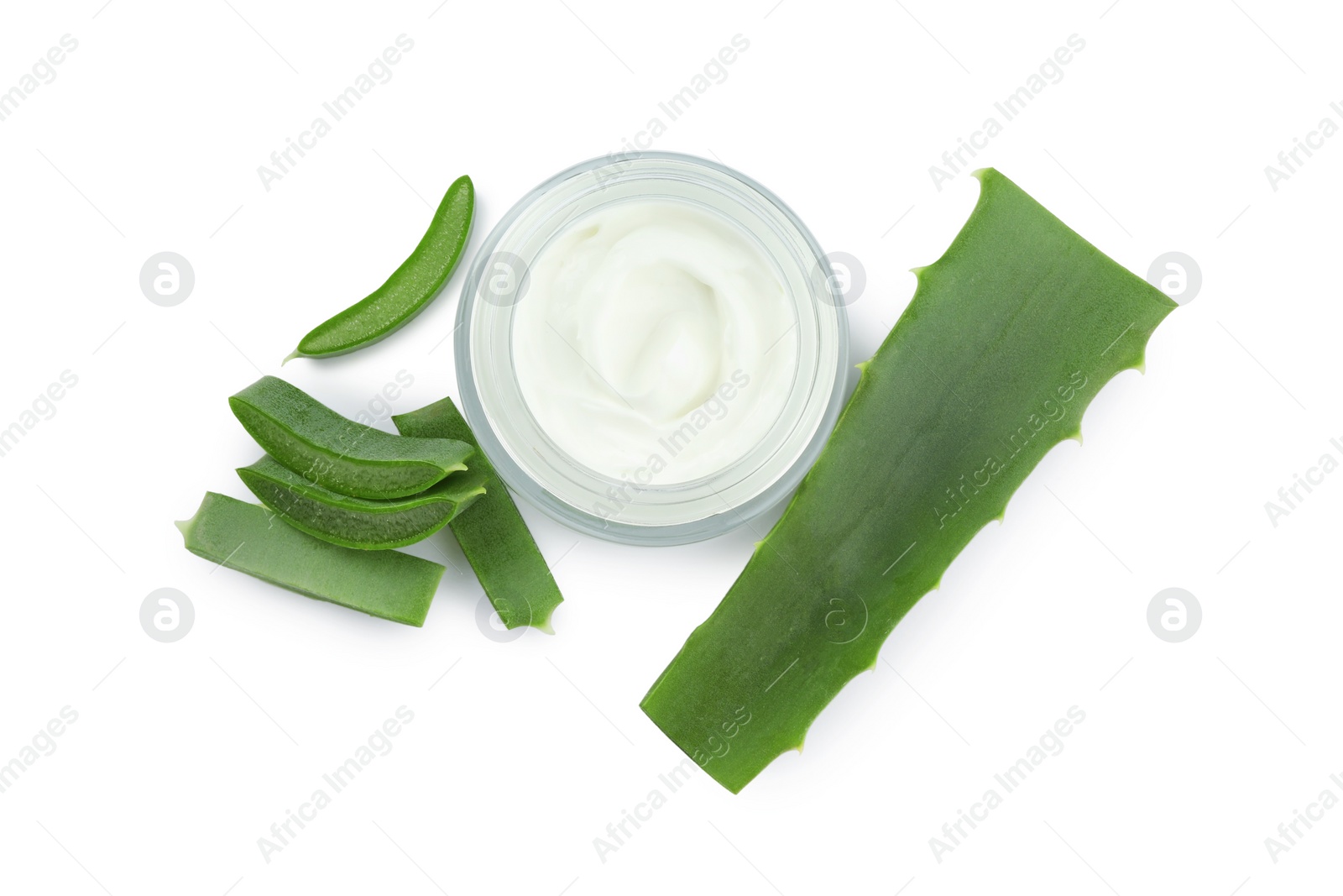 Photo of Jar of natural cream and cut aloe leaves isolated on white, top view