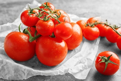 Fresh ripe red tomatoes on table