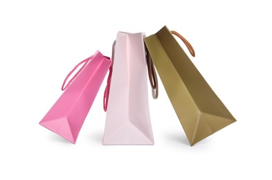 Colorful paper shopping bags isolated on white