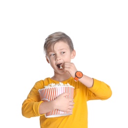 Photo of Cute boy with popcorn bucket isolated on white