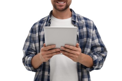 Photo of Happy man with tablet on white background, closeup